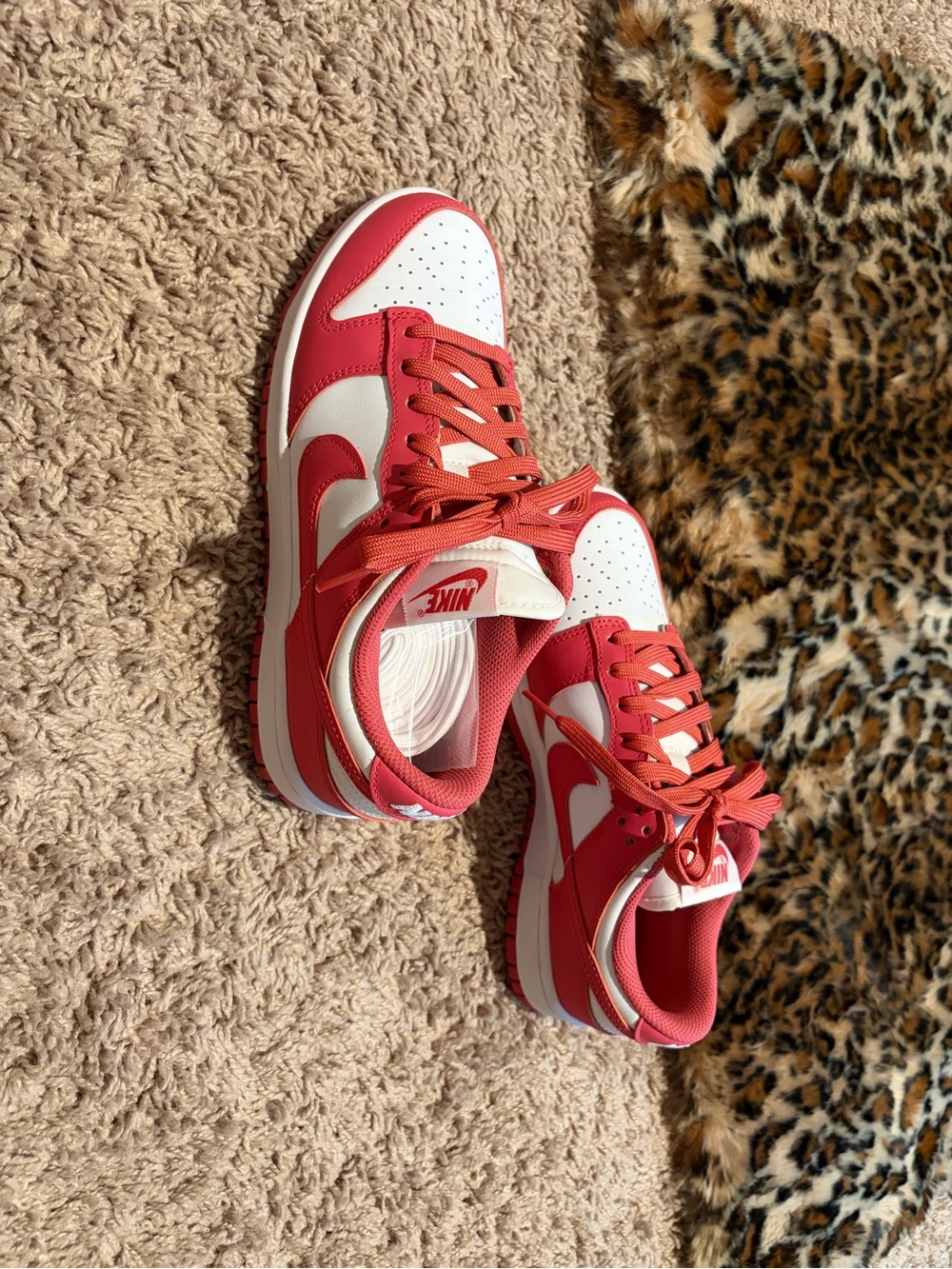 Nike Kids Red and White Low-Top Sneakers with Bold Swoosh